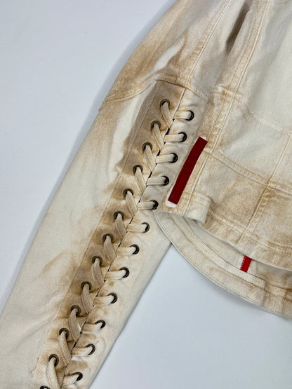 Prada brown and white denim jacket with lace detailing and faded wash effect.