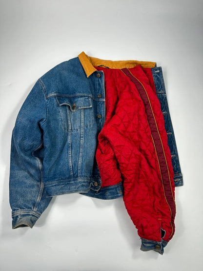 Marithé François Girbaud blue and red reversible denim bomber jacket with logo details.