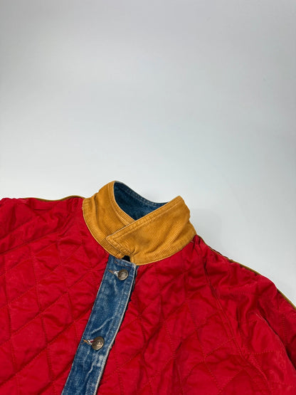 Marithé François Girbaud blue and red reversible denim bomber jacket with logo details.
