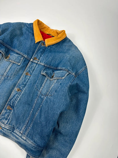 Marithé François Girbaud blue and red reversible denim bomber jacket with logo details.