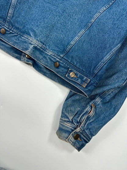 Marithé François Girbaud blue and red reversible denim bomber jacket with logo details.