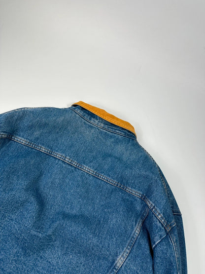 Marithé François Girbaud blue and red reversible denim bomber jacket with logo details.