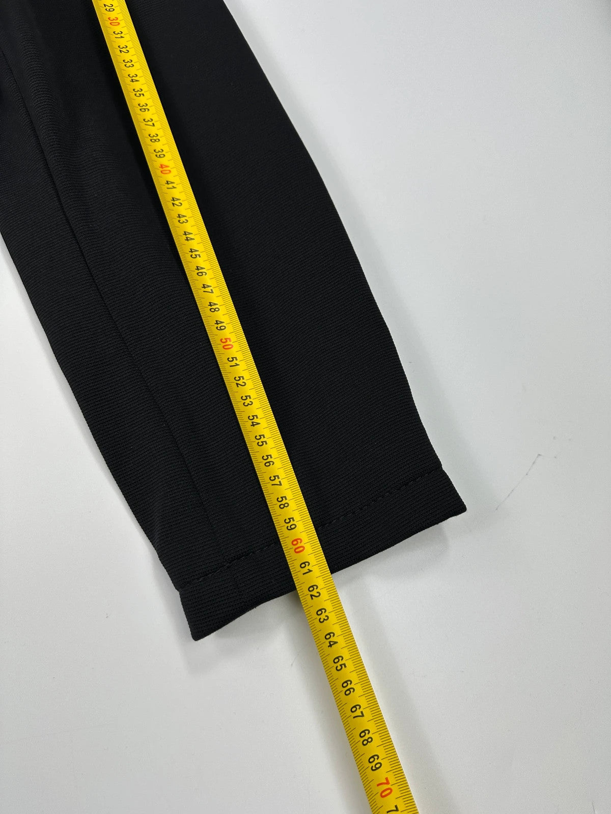 Prada black nylon Harrington bomber jacket with padded lining and vintage logo details.