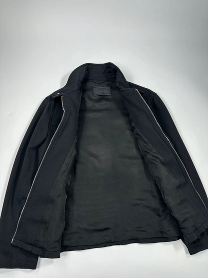 Prada black nylon Harrington bomber jacket with padded lining and vintage logo details.