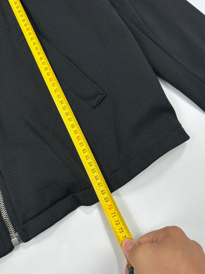 Prada black nylon Harrington bomber jacket with padded lining and vintage logo details.