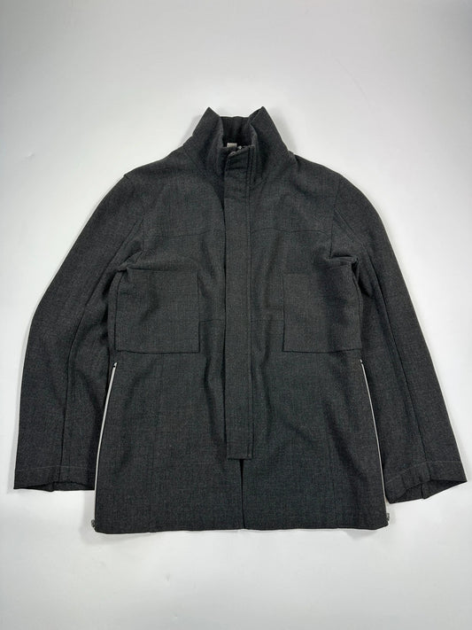 Marithé François Girbaud grey tech jacket with side zippers and minimalist design.