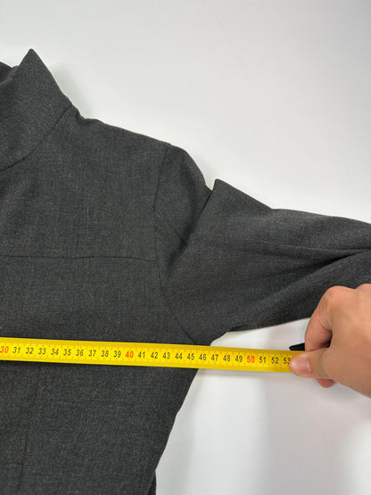 Marithé François Girbaud grey tech jacket with side zippers and minimalist design.