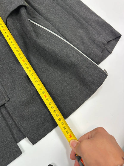Marithé François Girbaud grey tech jacket with side zippers and minimalist design.