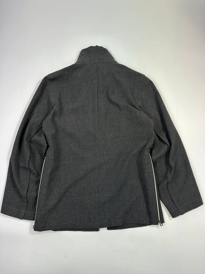 Marithé François Girbaud grey tech jacket with side zippers and minimalist design.