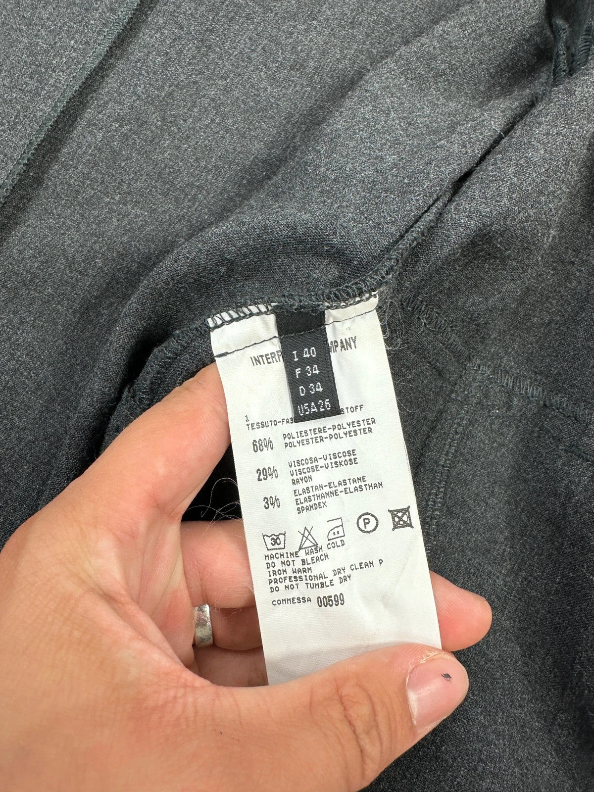 Marithé François Girbaud grey tech jacket with side zippers and minimalist design.