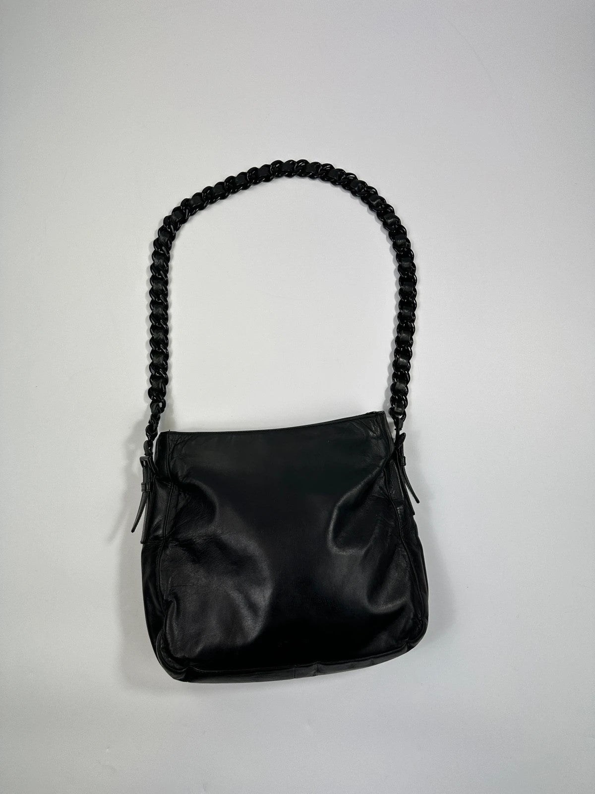 Prada black leather shoulder bag with chain straps from SS99 collection.