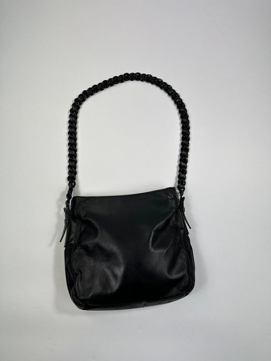 Prada black leather shoulder bag with chain straps from SS99 collection.