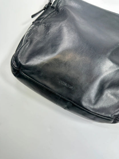 Prada black leather shoulder bag with chain straps from SS99 collection.