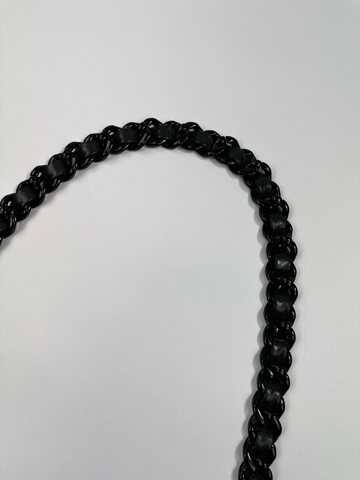 Prada black leather shoulder bag with chain straps from SS99 collection.