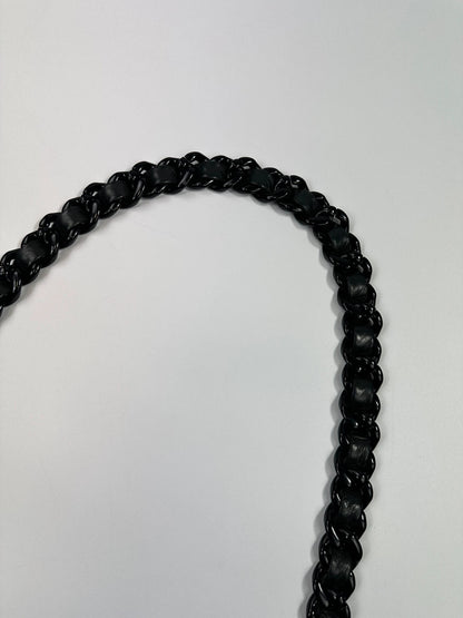 Prada black leather shoulder bag with chain straps from SS99 collection.