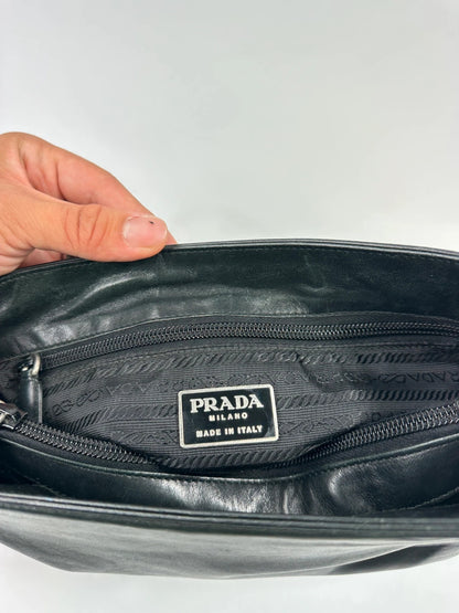 Prada black leather shoulder bag with chain straps from SS99 collection.