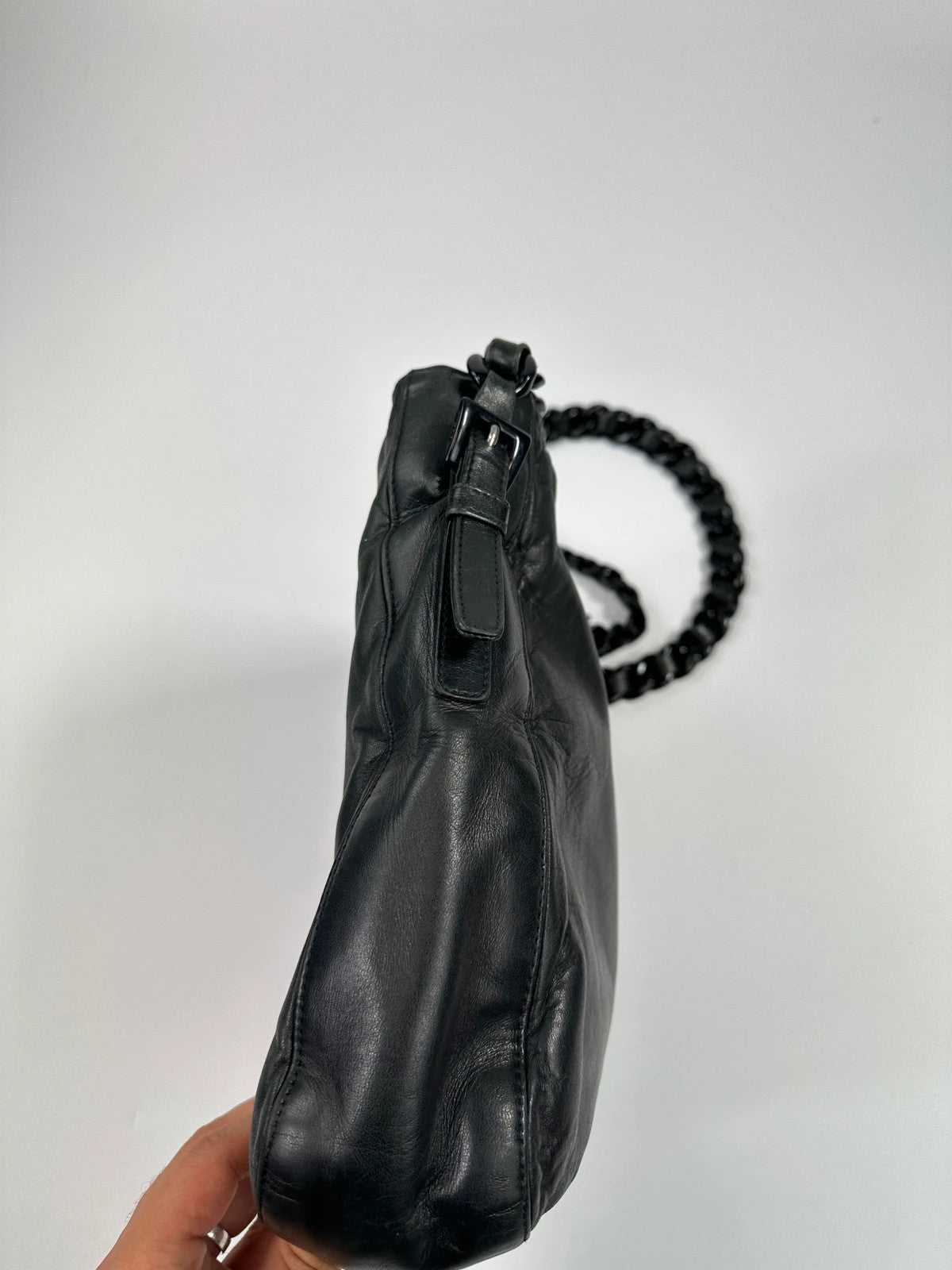 Prada black leather shoulder bag with chain straps from SS99 collection.