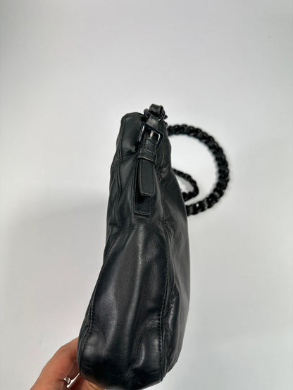 Prada black leather shoulder bag with chain straps from SS99 collection.