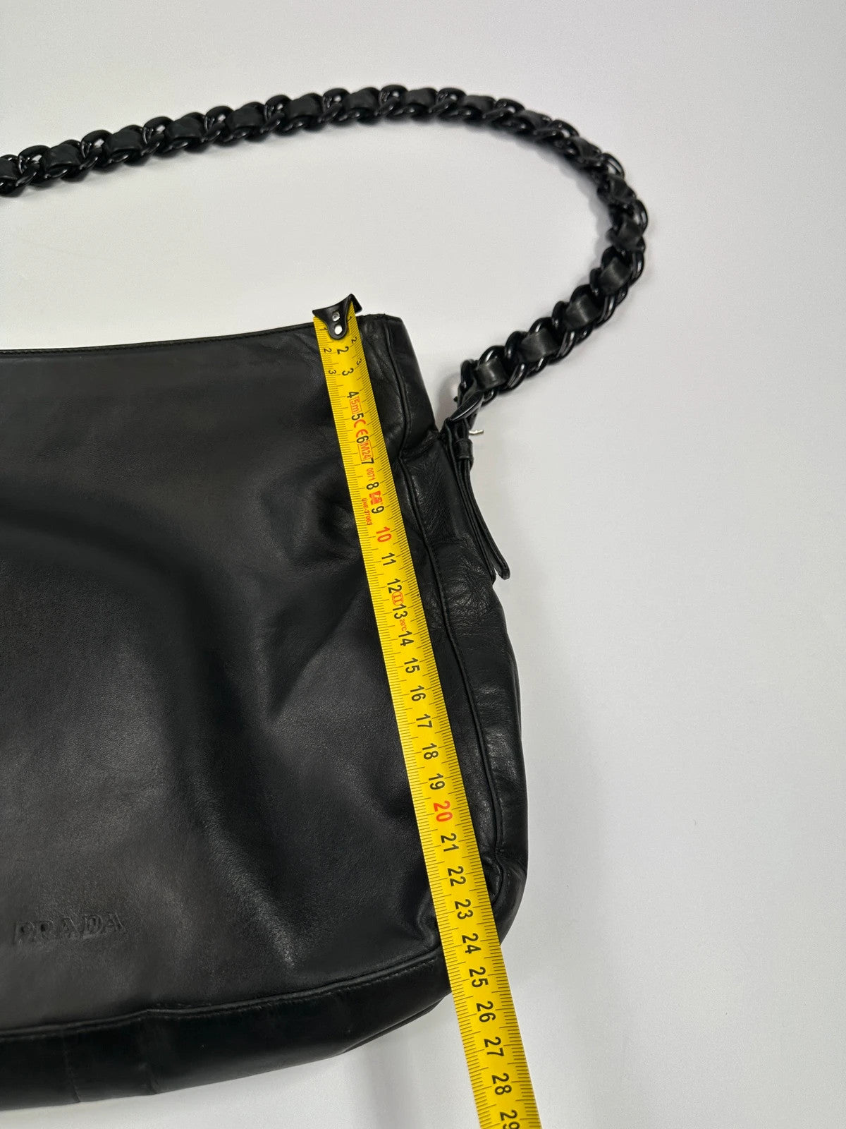Prada black leather shoulder bag with chain straps from SS99 collection.