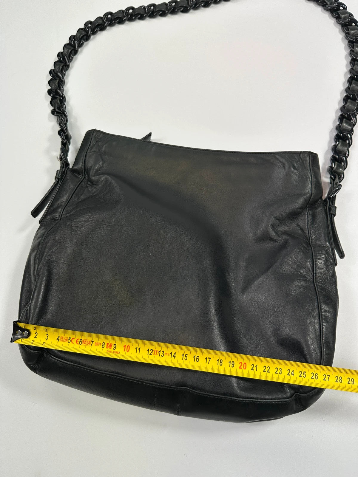 Prada black leather shoulder bag with chain straps from SS99 collection.