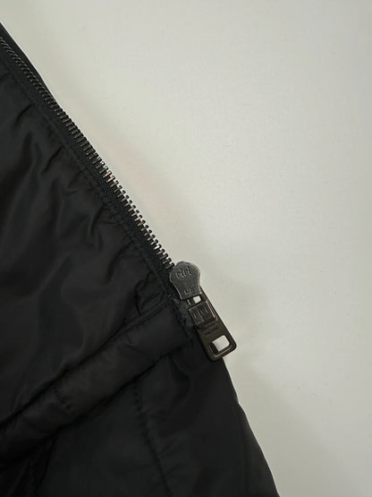 Prada black padded quilted nylon jacket with ribbed side panels and logo detailing.
