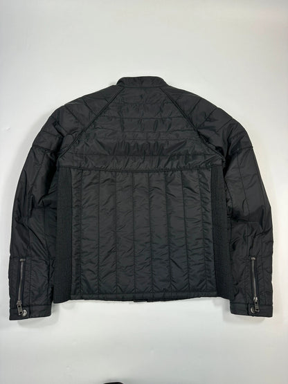 Prada black padded quilted nylon jacket with ribbed side panels and logo detailing.