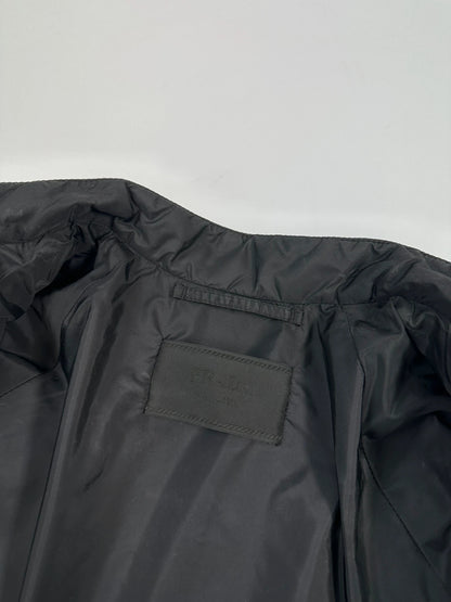 Prada black padded quilted nylon jacket with ribbed side panels and logo detailing.