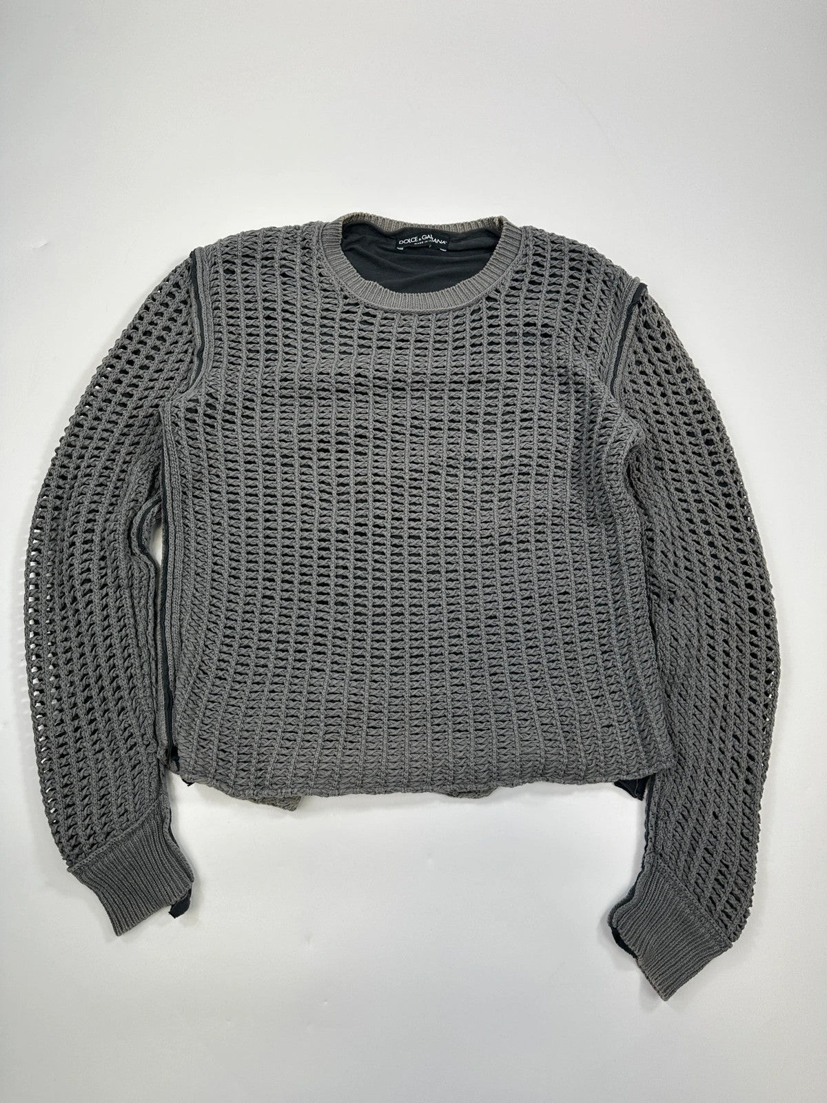 Dolce & Gabbana grey and black mesh knit sweater with layered t-shirt design.