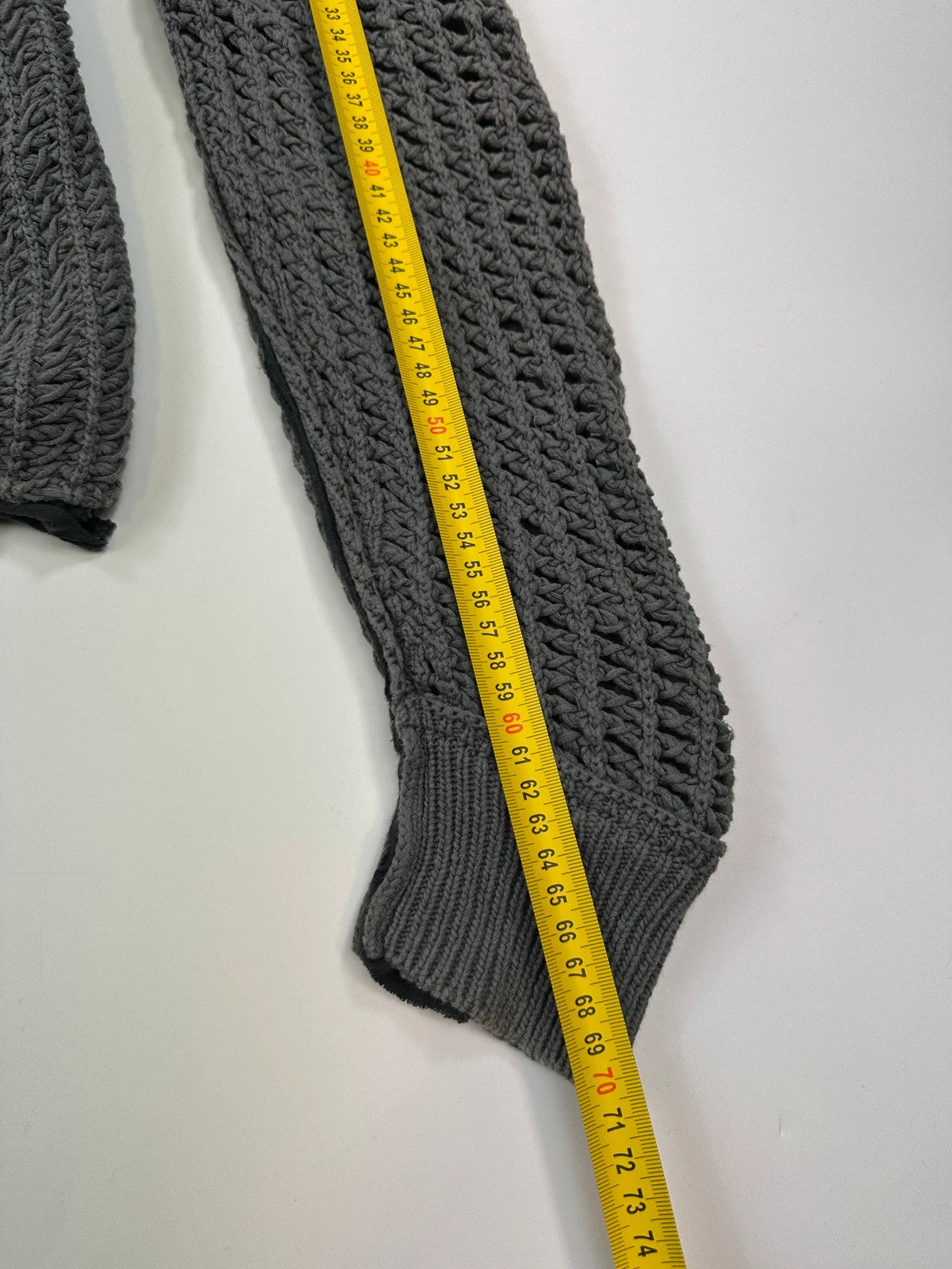 Dolce & Gabbana grey and black mesh knit sweater with layered t-shirt design.
