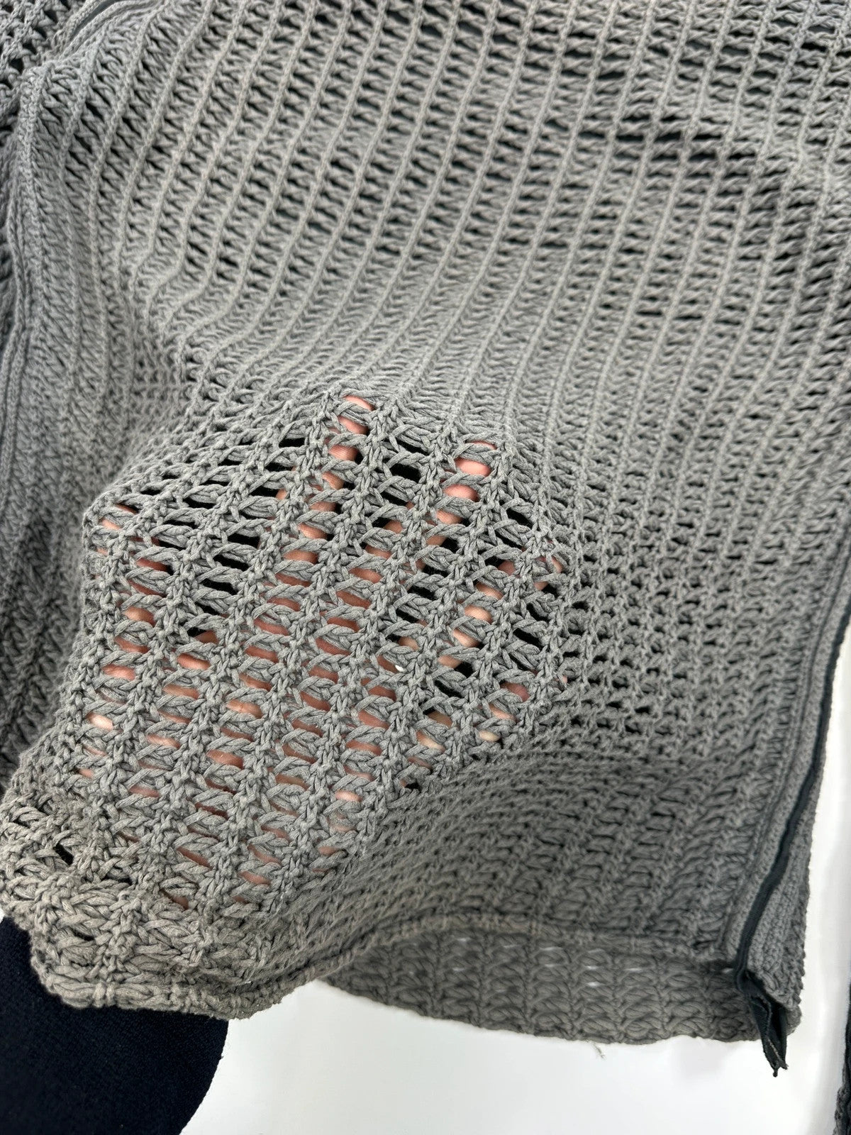 Dolce & Gabbana grey and black mesh knit sweater with layered t-shirt design.