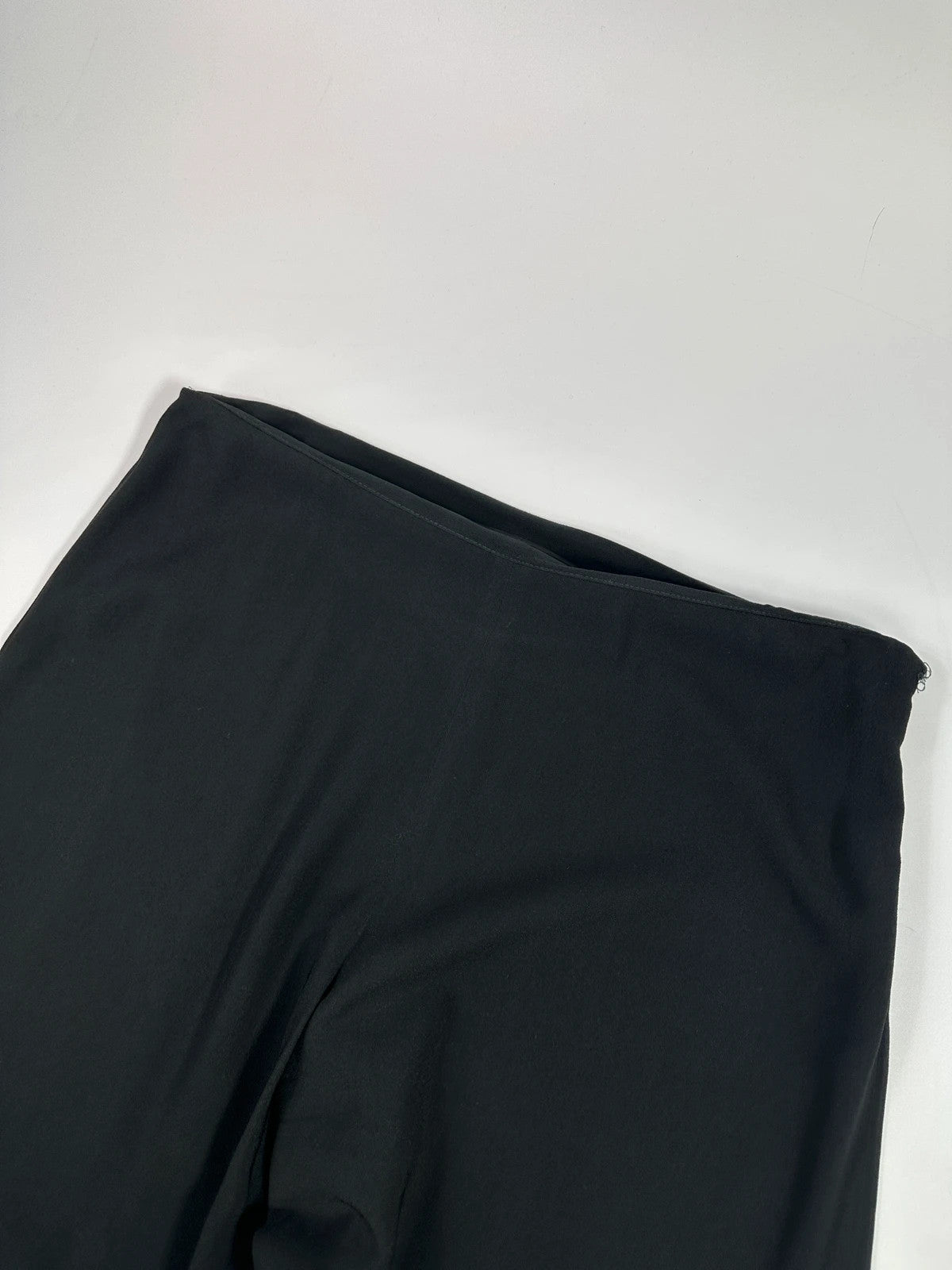 Jean-Paul Gaultier black wide-leg dress pants, vintage 2000s, soft rayon material.