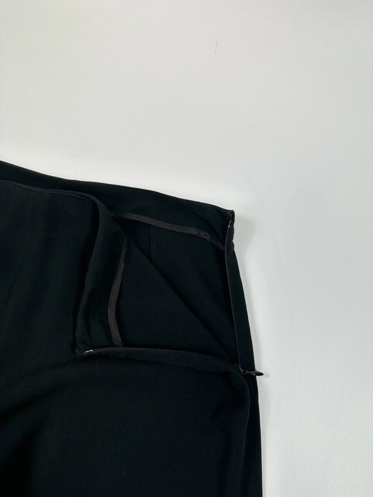 Jean-Paul Gaultier black wide-leg dress pants, vintage 2000s, soft rayon material.