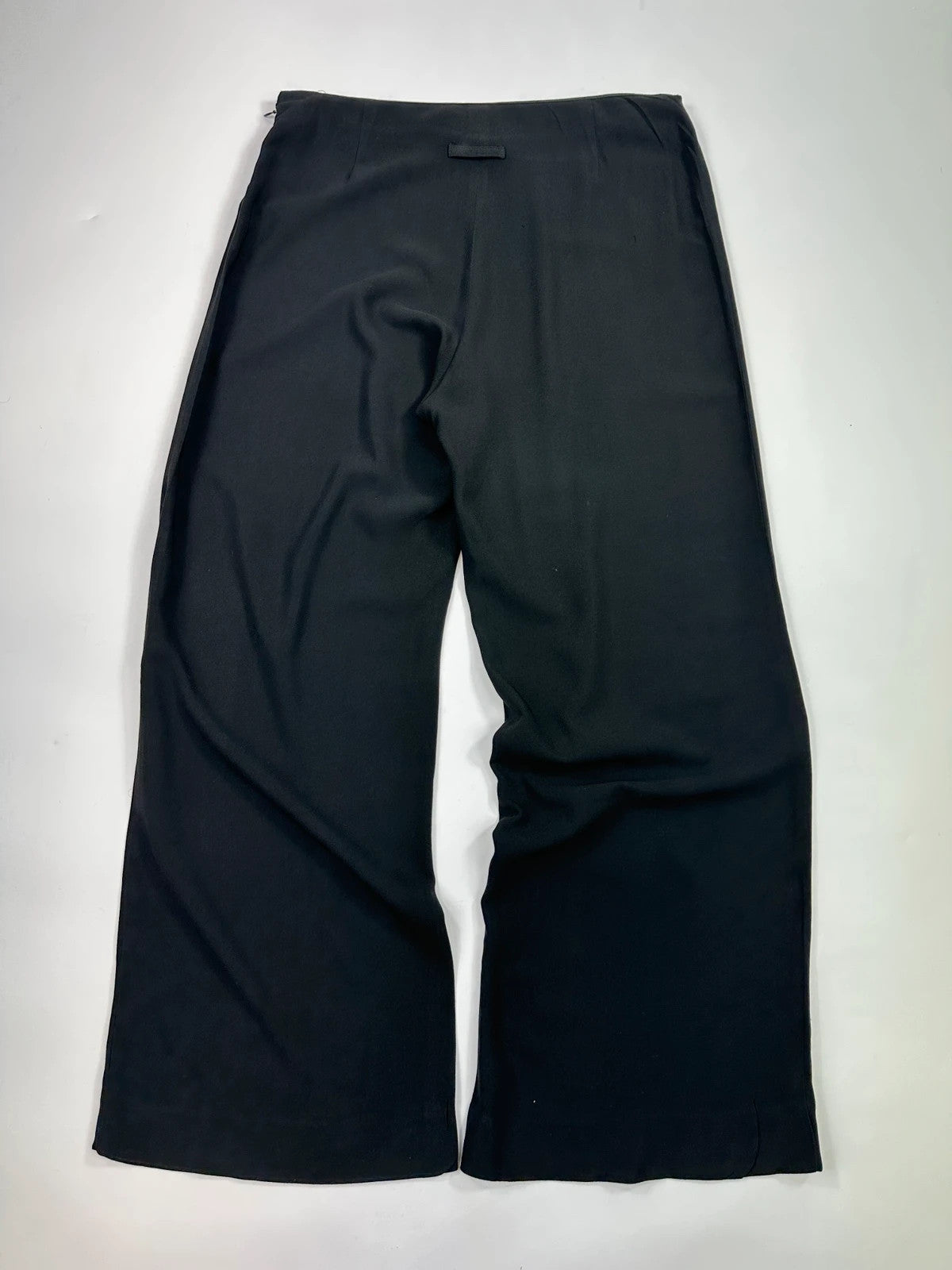 Jean-Paul Gaultier black wide-leg dress pants, vintage 2000s, soft rayon material.