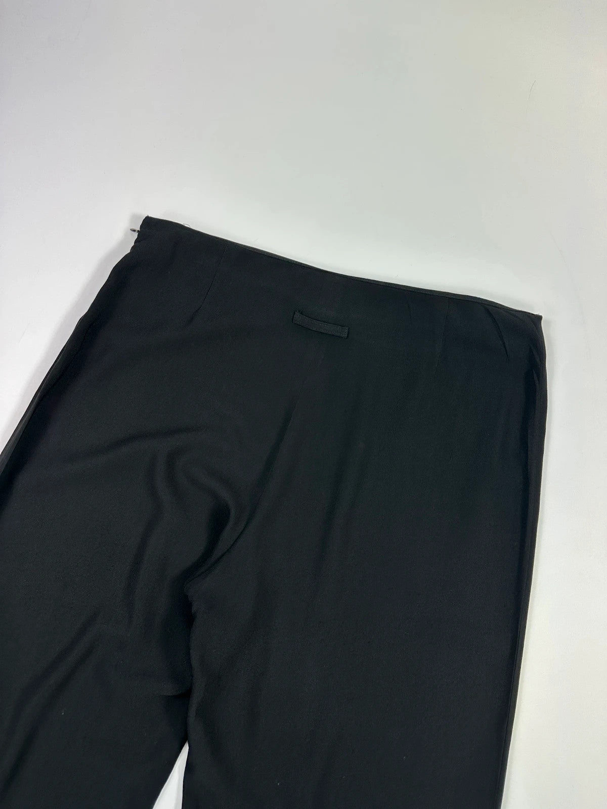 Jean-Paul Gaultier black wide-leg dress pants, vintage 2000s, soft rayon material.