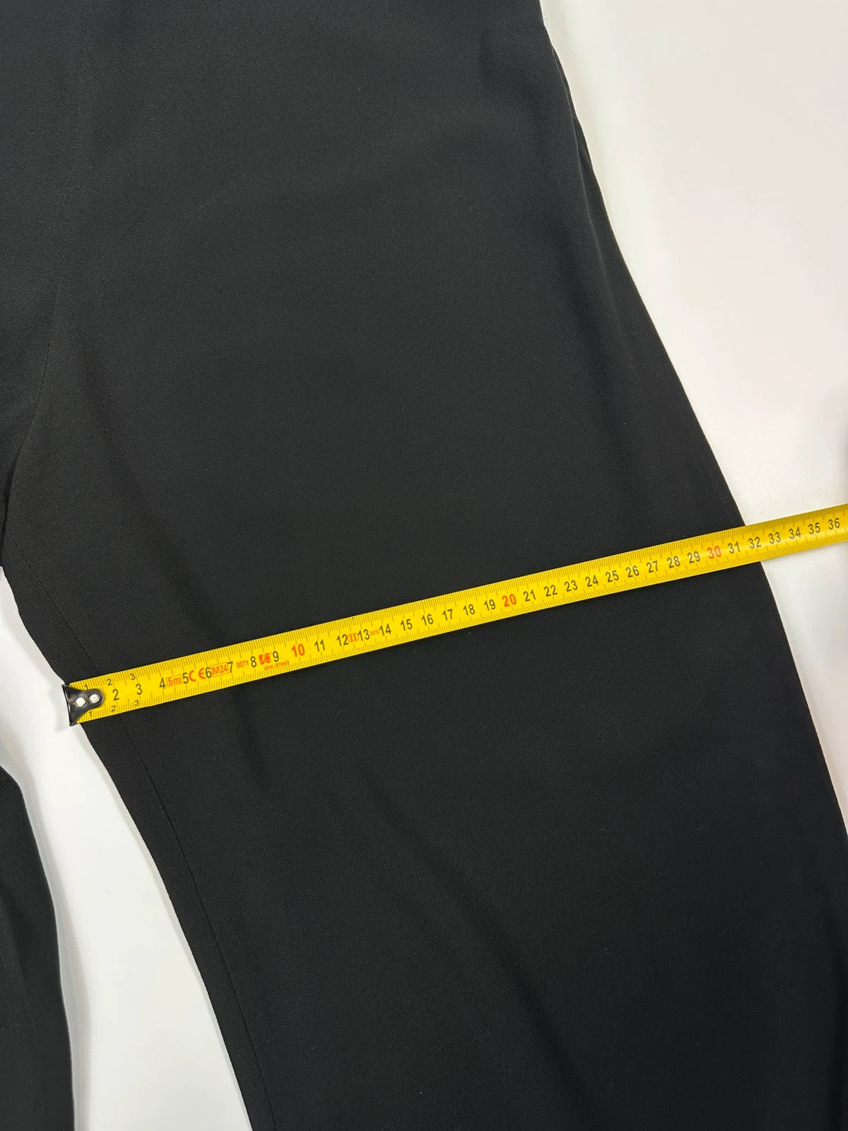 Jean-Paul Gaultier black wide-leg dress pants, vintage 2000s, soft rayon material.