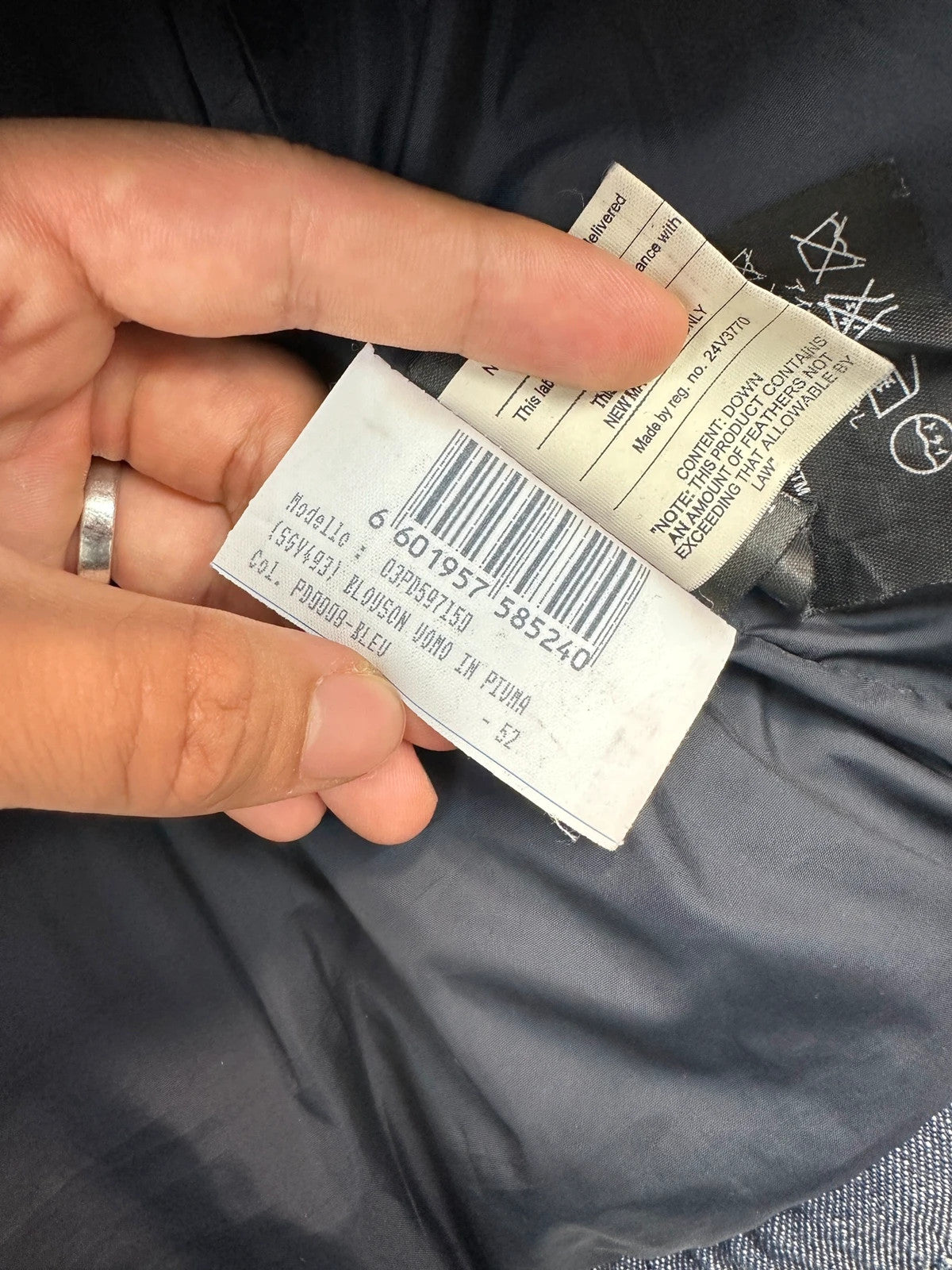 Prada blue hybrid down puffer jacket with removable hood and denim material.