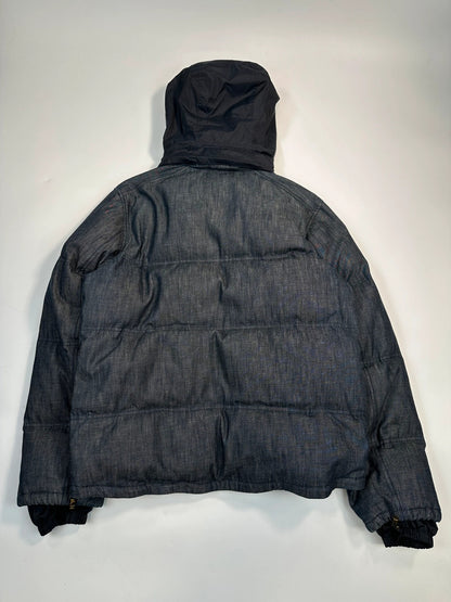 Prada blue hybrid down puffer jacket with removable hood and denim material.