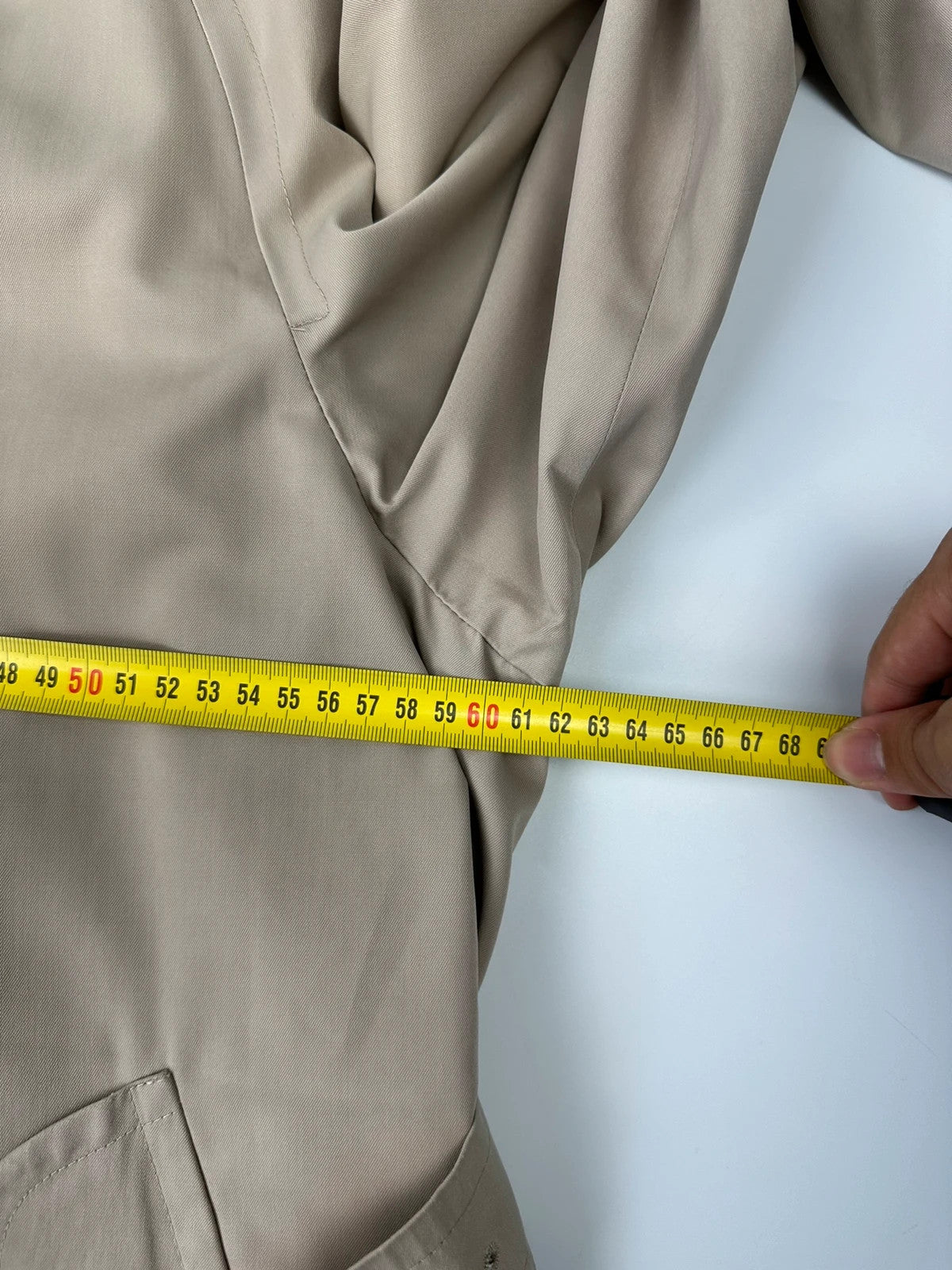 Burberrys beige trench coat jacket double breasted with removable lining and classic logo.