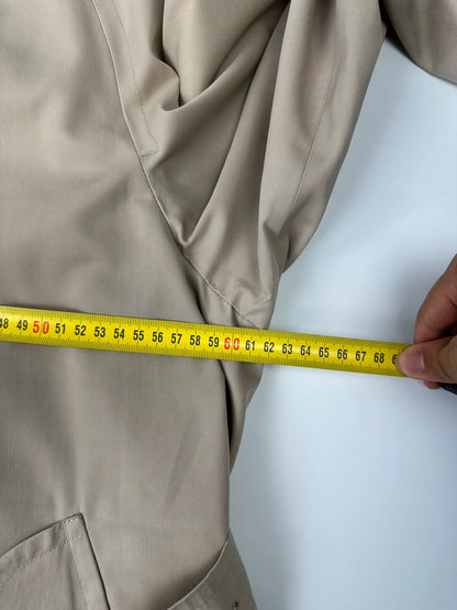 Burberrys beige trench coat jacket double breasted with removable lining and classic logo.
