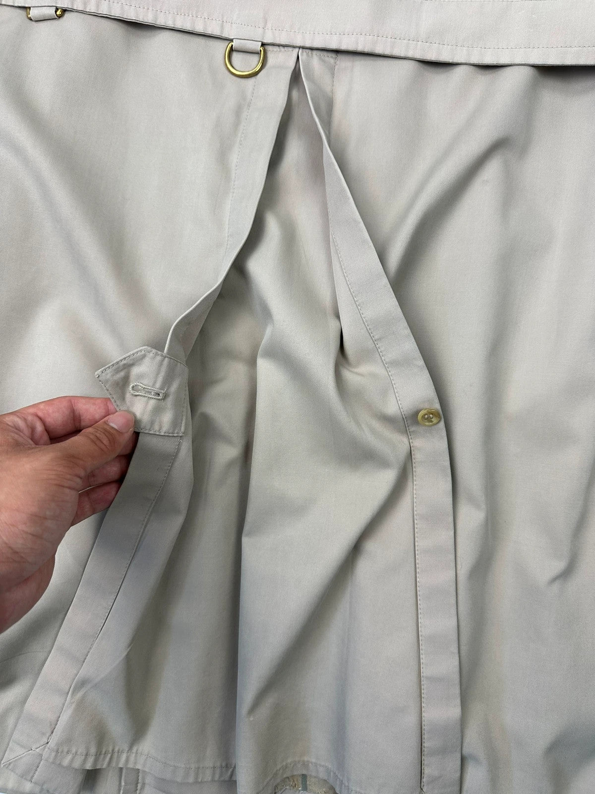 Burberrys beige trench coat jacket double breasted with removable lining and classic logo.