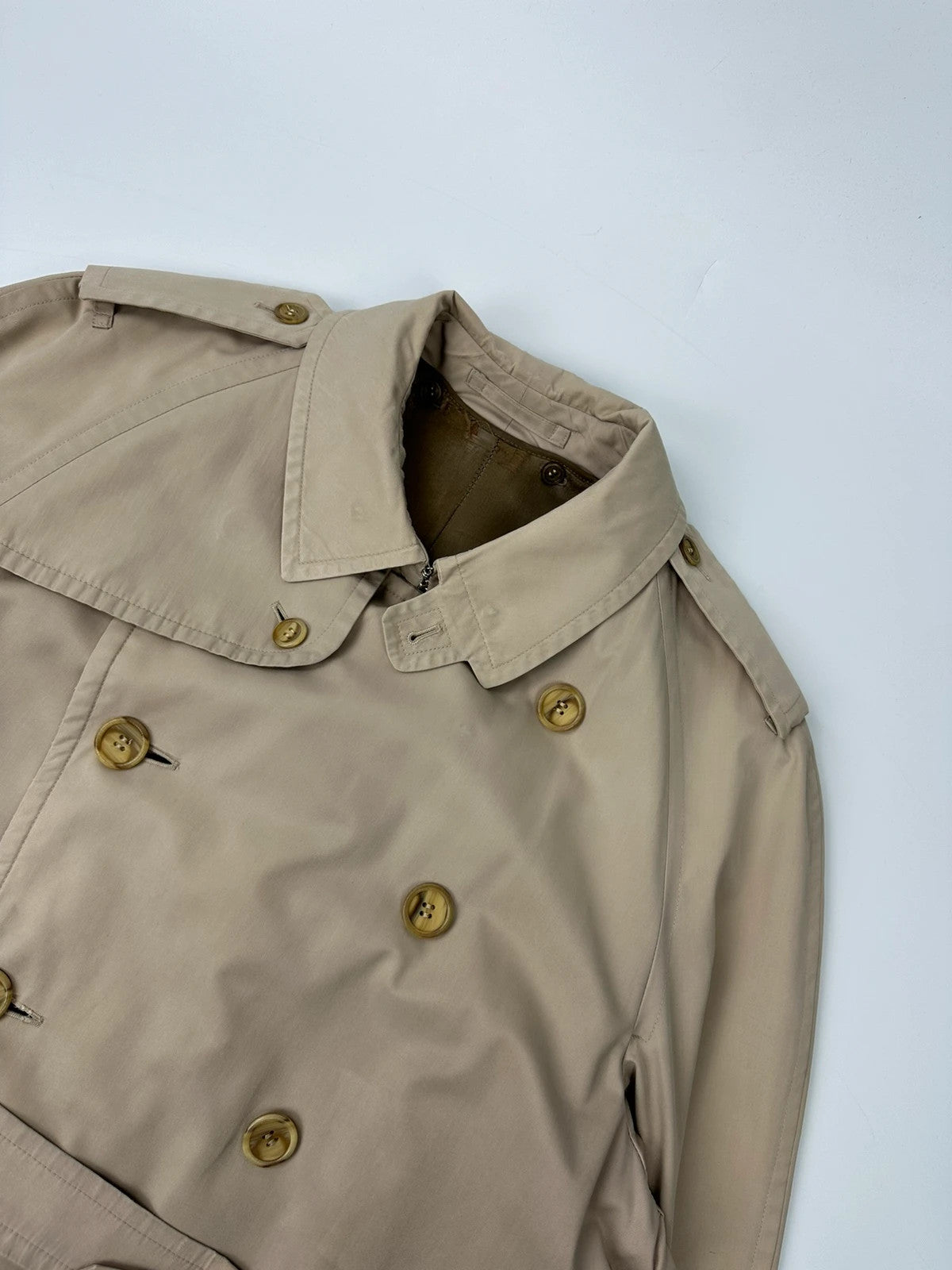 Burberrys beige trench coat jacket double breasted with removable lining and classic logo.