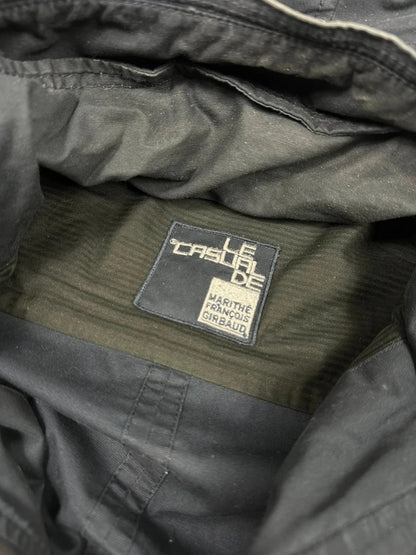 Marithé Francois Girbaud navy multi-pocket jacket adjustable fit packable design.