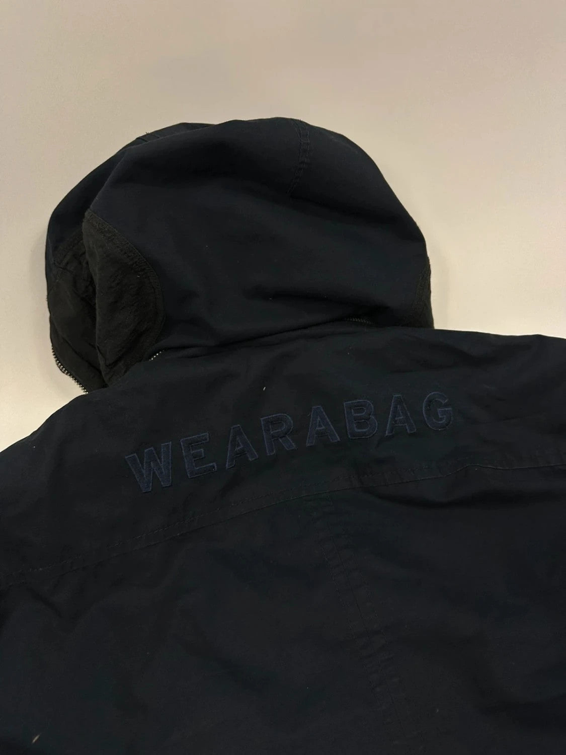 Marithé Francois Girbaud navy multi-pocket jacket adjustable fit packable design.