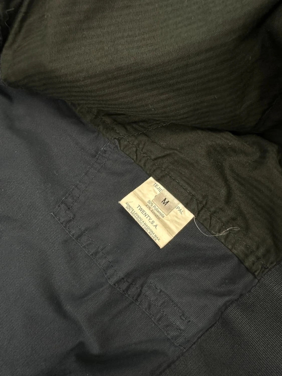 Marithé Francois Girbaud navy multi-pocket jacket adjustable fit packable design.