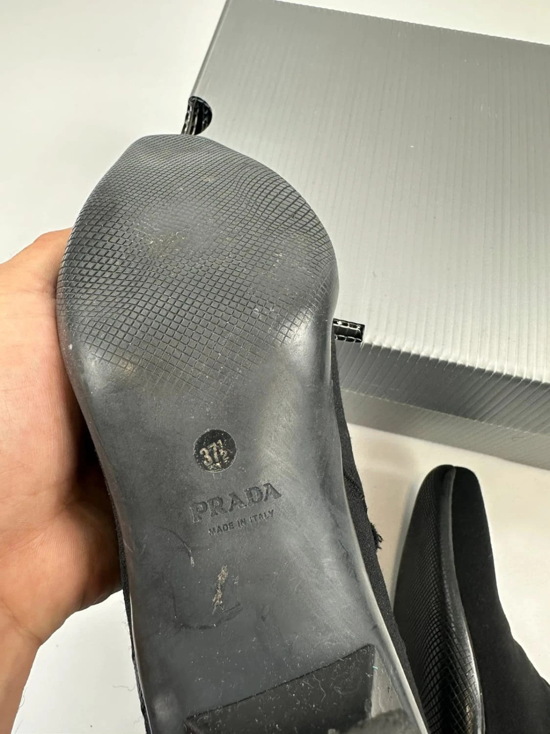 Prada black neoprene boots with pointed toe and leather interior.