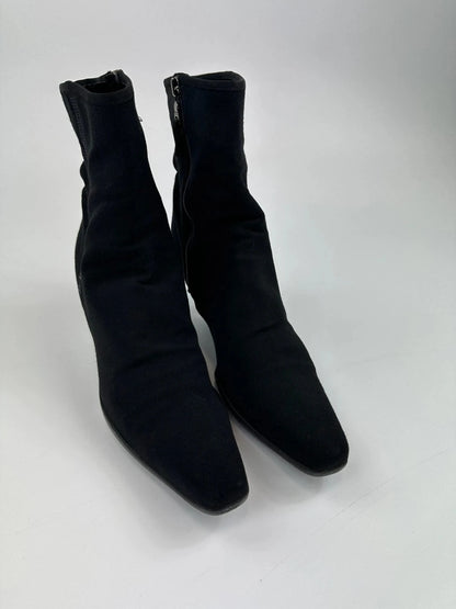 Prada black neoprene boots with pointed toe and leather interior.
