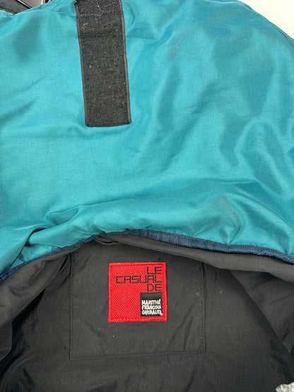 Marithé François Girbaud red and black messenger bag with mesh pocket and logo details.