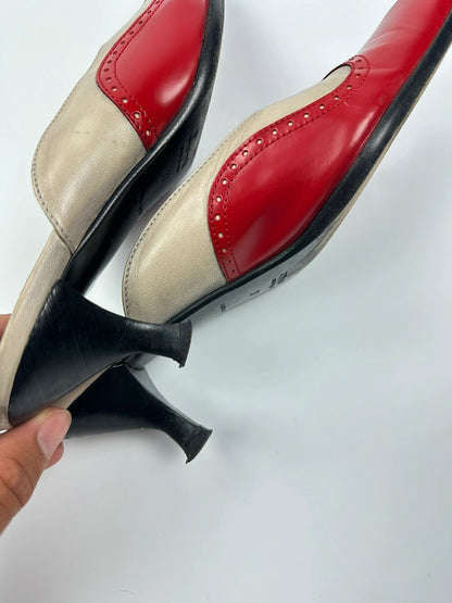 Miu Miu beige and red leather mules with kitten heels and minimalist design.