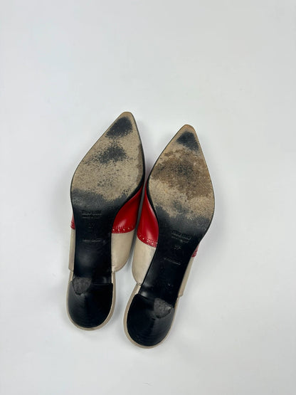 Miu Miu beige and red leather mules with kitten heels and minimalist design.
