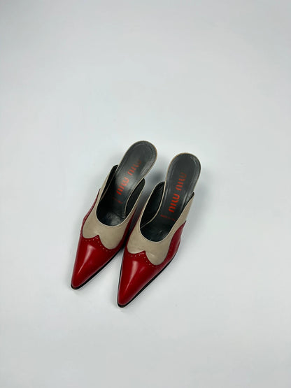 Miu Miu beige and red leather mules with kitten heels and minimalist design.